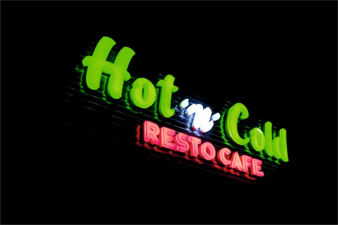 LED channel letters glowing on a building facade