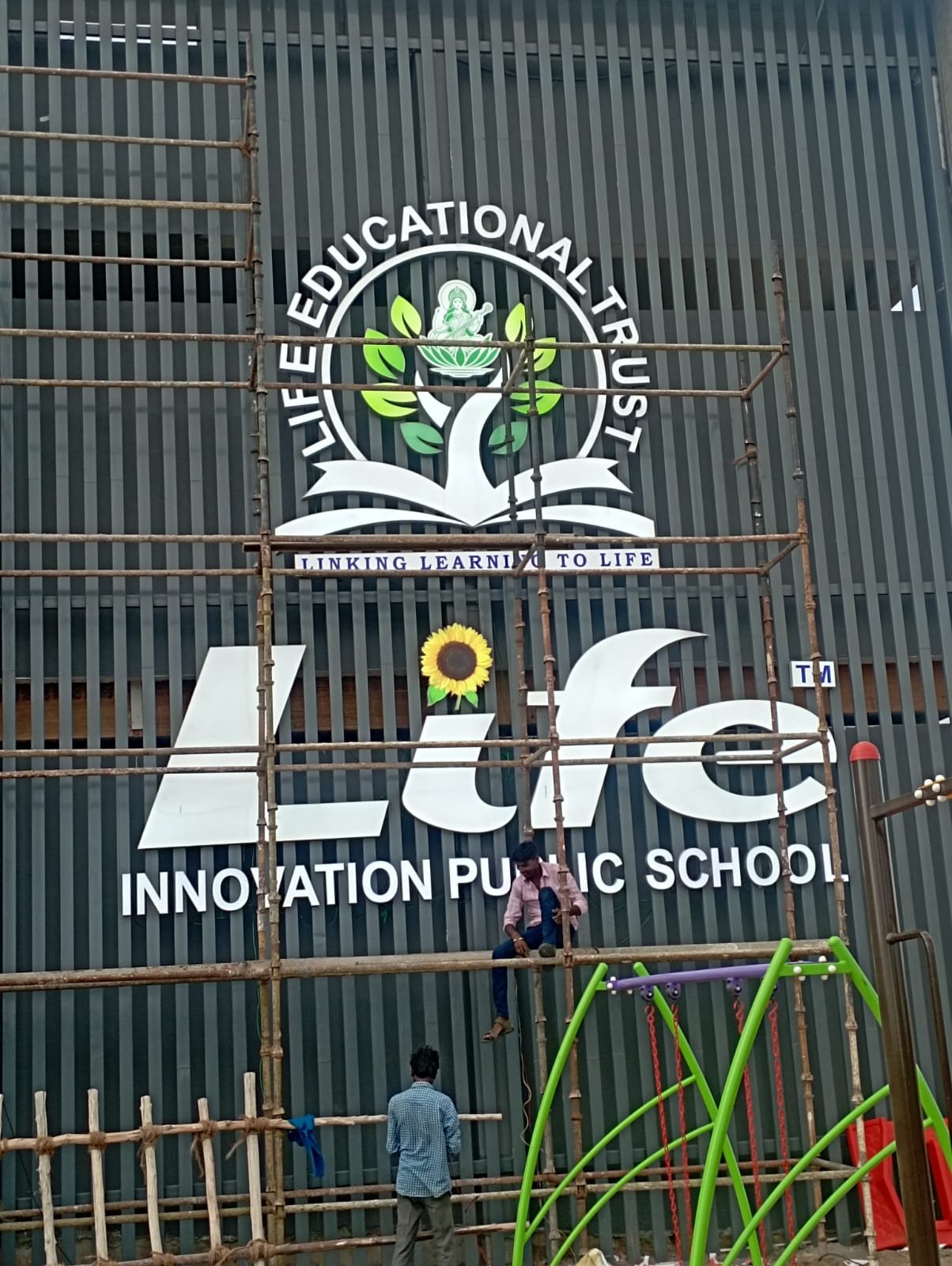 Sign installation at a shop entrance